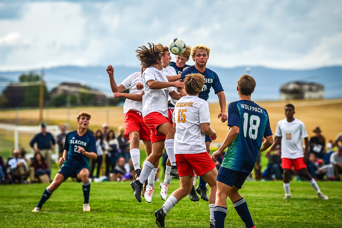 Glacier's Liam Ells (6) heads in a goal off a corner kick by Hans Coggins (11) in the first half against Missoula Hellgate at Glacier High School on Thursday, Aug. 31. (Casey Kreider/Daily Inter Lake)