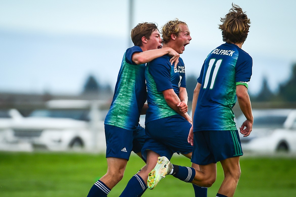 Glacier's Hunter Lisowski (10) celebrates with teammates after a goal in the second half against Missoula Hellgate at Glacier High School on Thursday, Aug. 31. (Casey Kreider/Daily Inter Lake)