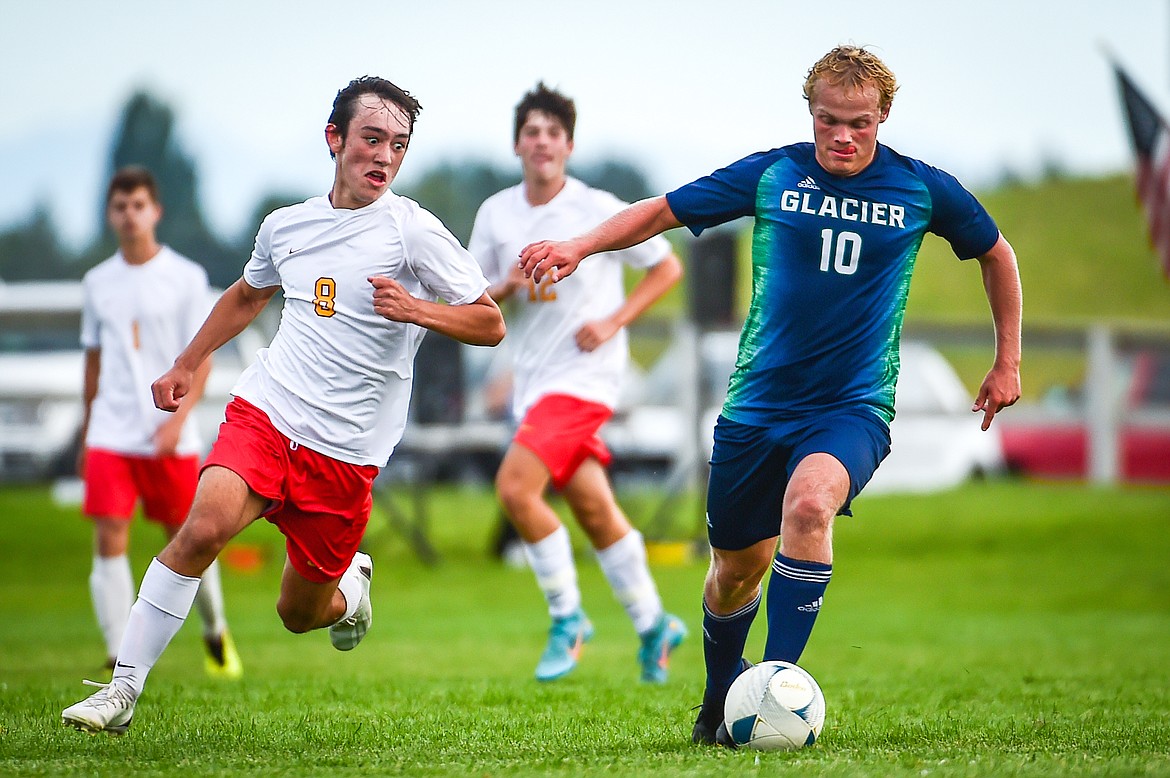 Glacier's Hunter Lisowski (10) works the ball upfield in the second half against Missoula Hellgate at Glacier High School on Thursday, Aug. 31. (Casey Kreider/Daily Inter Lake)