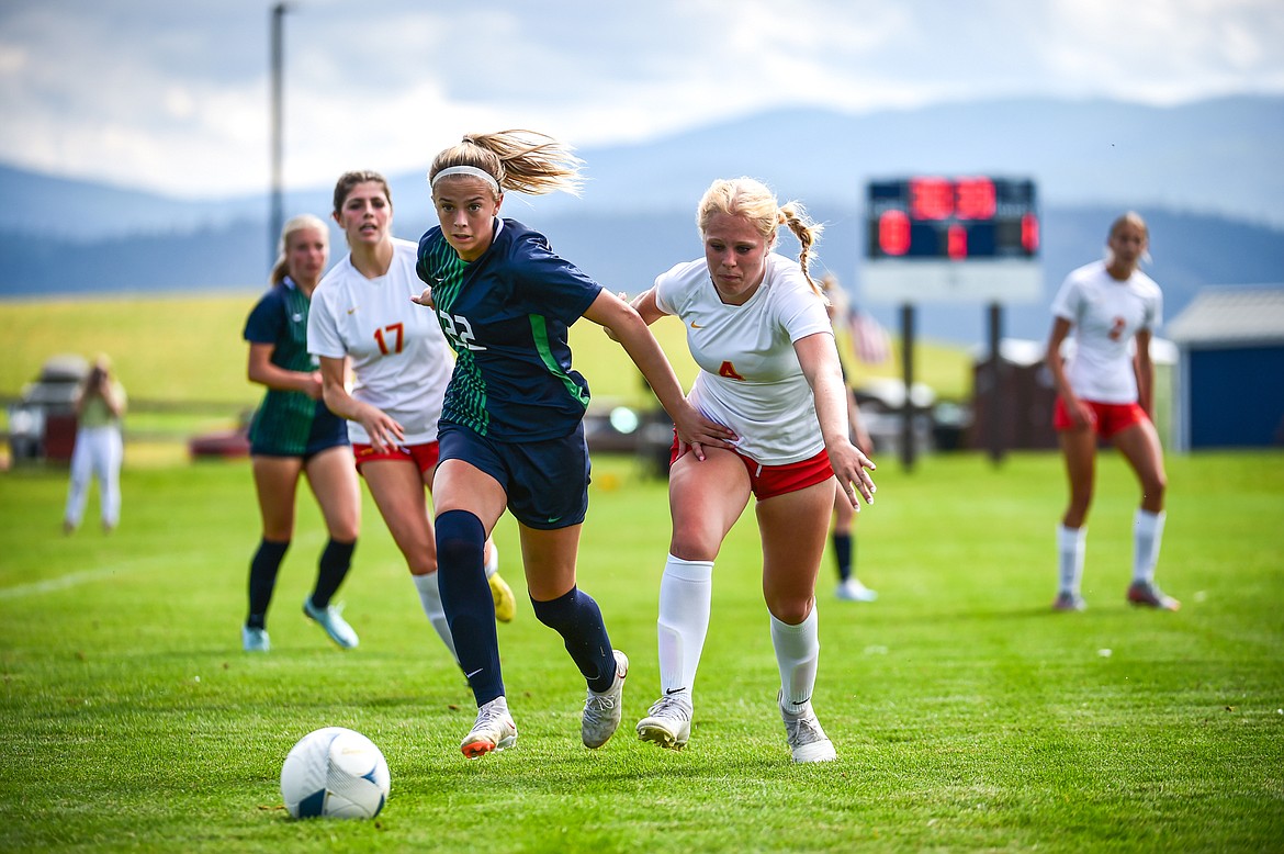 Glacier's Reagan Brisendine (22) chases down a ball in the first half against Missoula Hellgate at Glacier High School on Thursday, Aug. 31. (Casey Kreider/Daily Inter Lake)