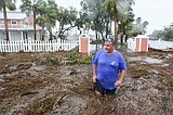 Tropical Storm Idalia leaves shredded homes, roads blocked with powerlines in Florida and Georgia