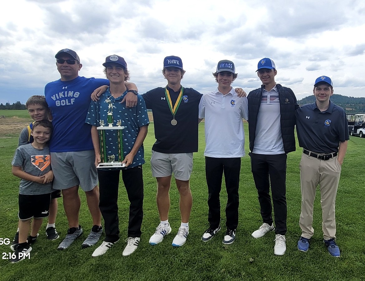 Courtesy photo
The Coeur d'Alene High boys golf team captured the team title at the Lakeland Invitational on Thursday at The Links Golf Club in Post Falls. From left are Caden Bennett, Cam Bennett, coach Chase Bennett, Jameson Dale, Grant Potter, Ben Crabb, Landon Stringham and Jake-Ryan Borowski.