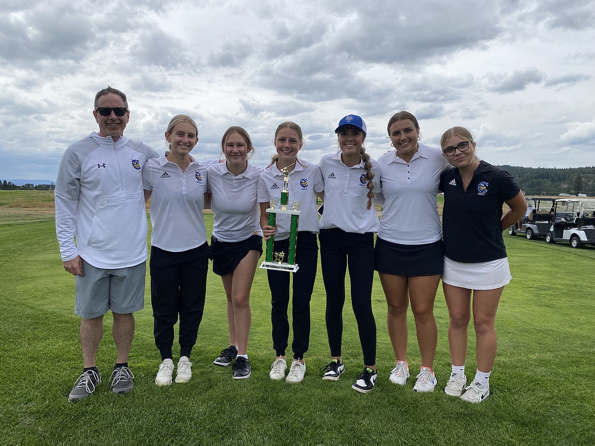 Courtesy photo
The Coeur d'Alene High girls golf team won the Lakeland Invitational on Thursday at The Links Golf Club in Post Falls. From left are coach Jeff Lake, Ava Yates, Addie Garcia, Stella Deitz, Sophia Vignale, Aniston Ewing and Chloe Orear.