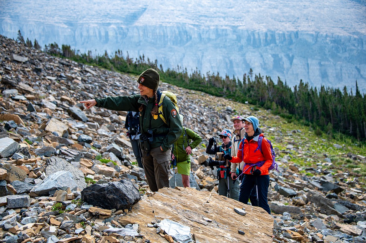 Glacier’s Citizen Science Program Manager Jami Belt points to a pika during a survey trip on Aug. 24, 2023. (photo courtesy of Andrew Smith)