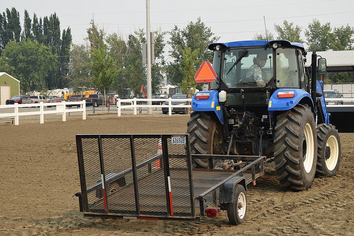 There’s an art to driving a tractor with a trailer, and competitors like Dale Hart proved that during this year’s tractor driving contest at the Grant County Fair.