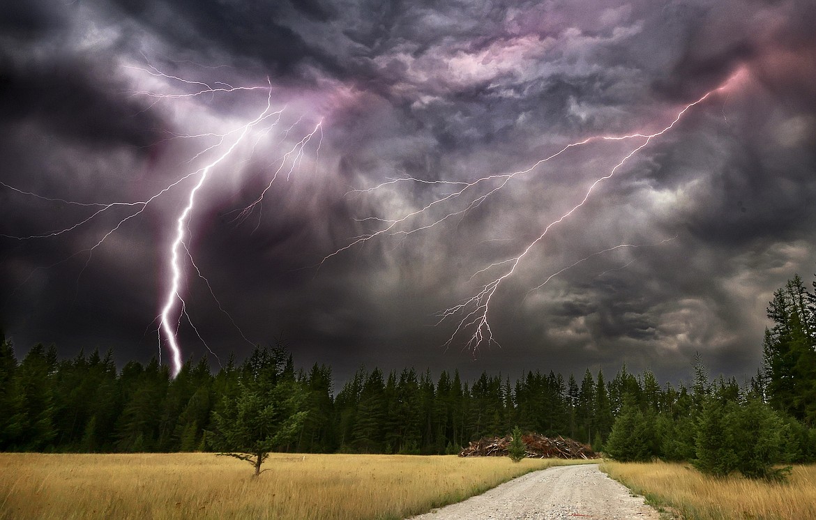 Lightning from an incoming rainstorm flashes across the sky near Columbia Falls on Tuesday, Aug. 29. (Jeremy Weber/Bigfork Eagle)