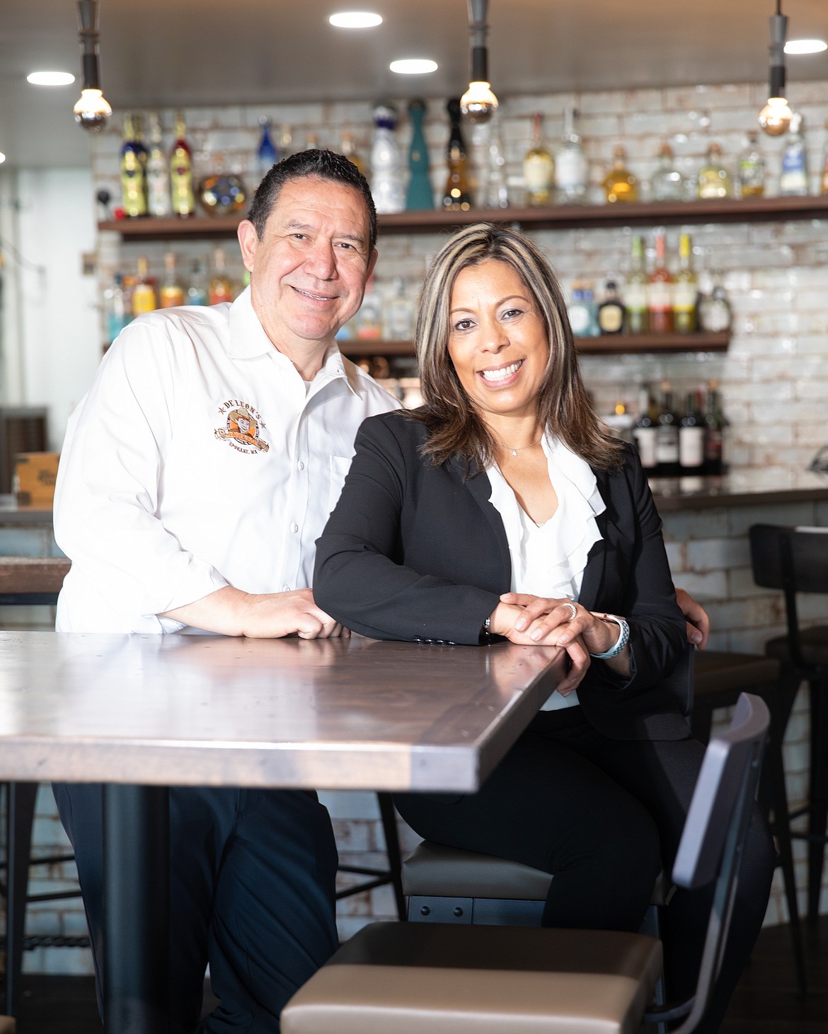 Sergio De Leon and his wife of 25 years, Mayra De Leon, in their restaurant, De Leon's Tex-Mex Grill.