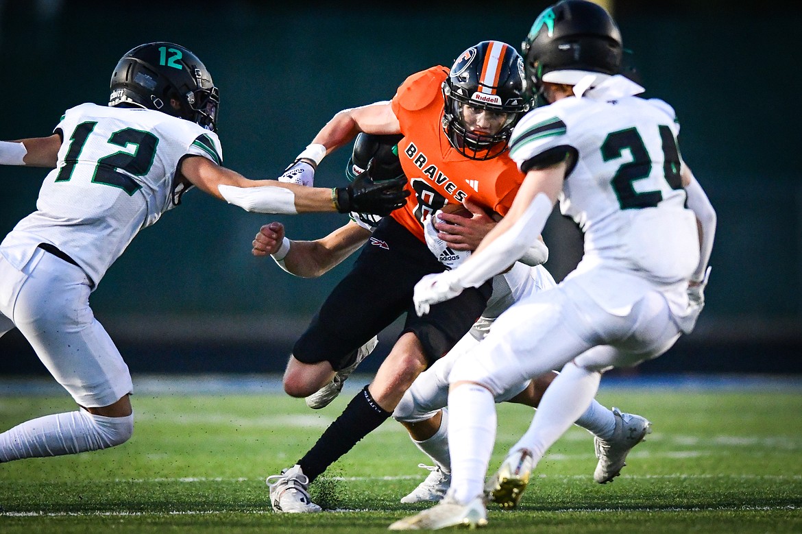 Flathead wide receiver Noah Sonju (8) picks up yardage after a reception in the third quarter against Belgrade at Legends Stadium on Friday, Sept. 1. (Casey Kreider/Daily Inter Lake)