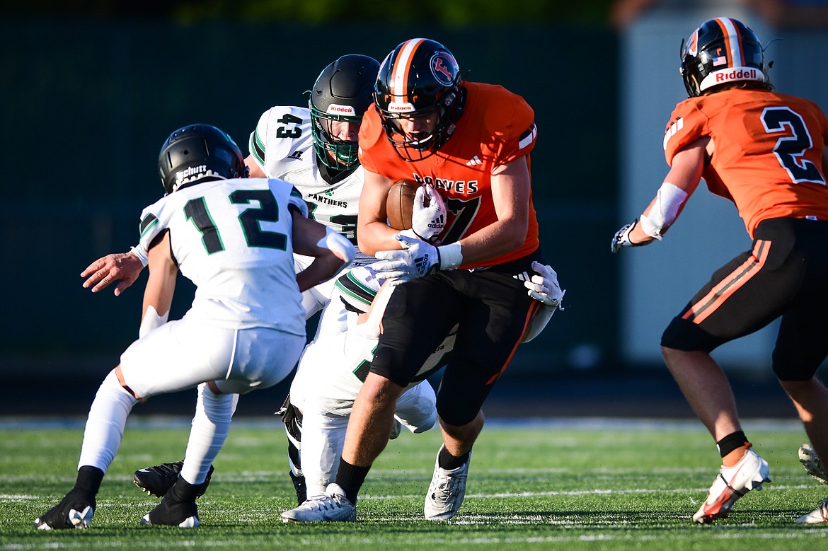 Flathead tight end Braden Capser (47) picks up yardage after a reception in the first quarter against Belgrade at Legends Stadium on Friday, Sept. 1. (Casey Kreider/Daily Inter Lake)