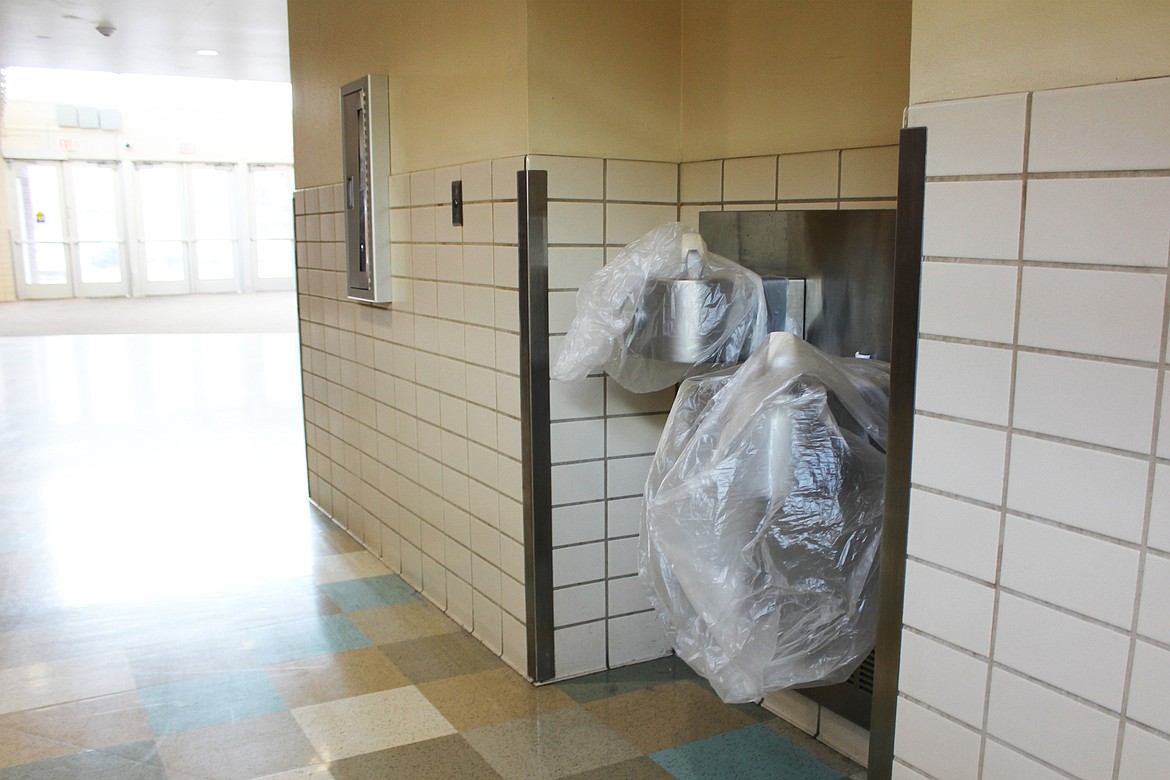 A pair of drinking fountains, photographed in February 2023, at Sentinel High School in Missoula, Montana, tested for levels of lead that required school officials to either fix the fountains or shut them off. Montana has earmarked $3.7 million to fix widespread high levels of lead in school drinking water, but officials acknowledge it likely isn’t enough to solve the problem. (Katheryn Houghton/KFF Health News)