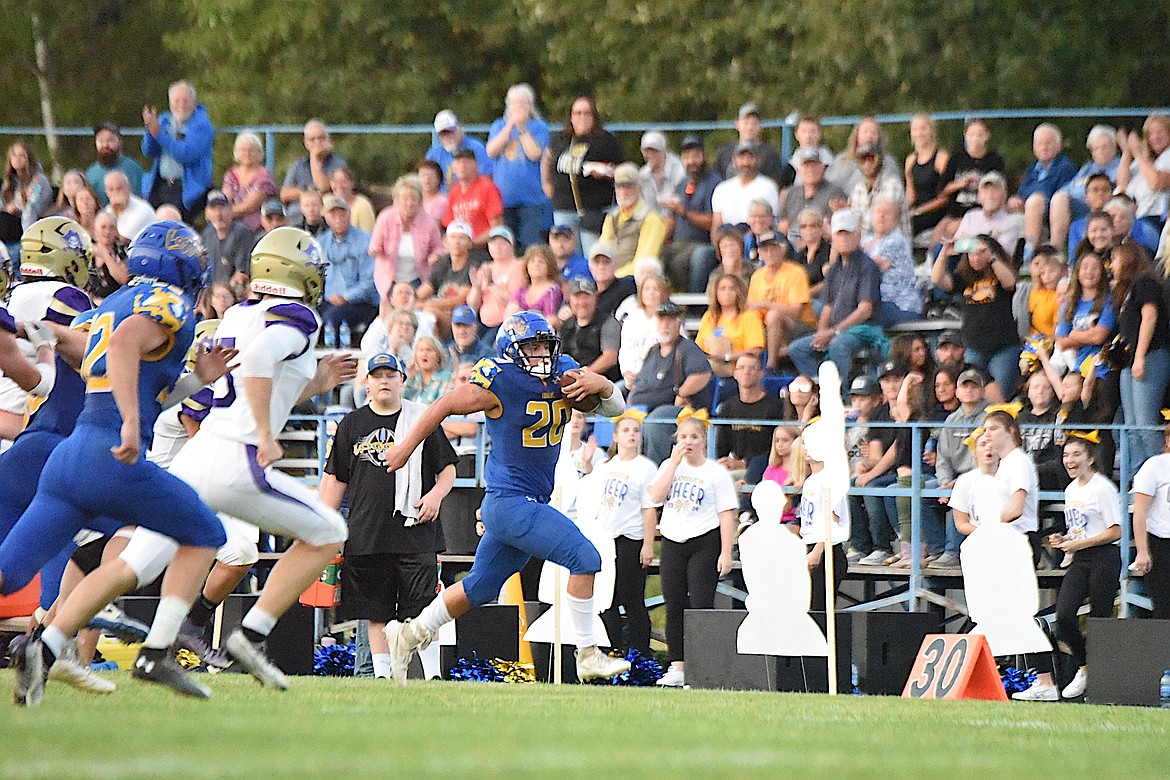 Libby's Jace DeShazer breaks free for a long run against Polson on Sept. 1 at Logger Stadium. Lamere scored two touchdowns. (Scott Shindledecker/The Western News)