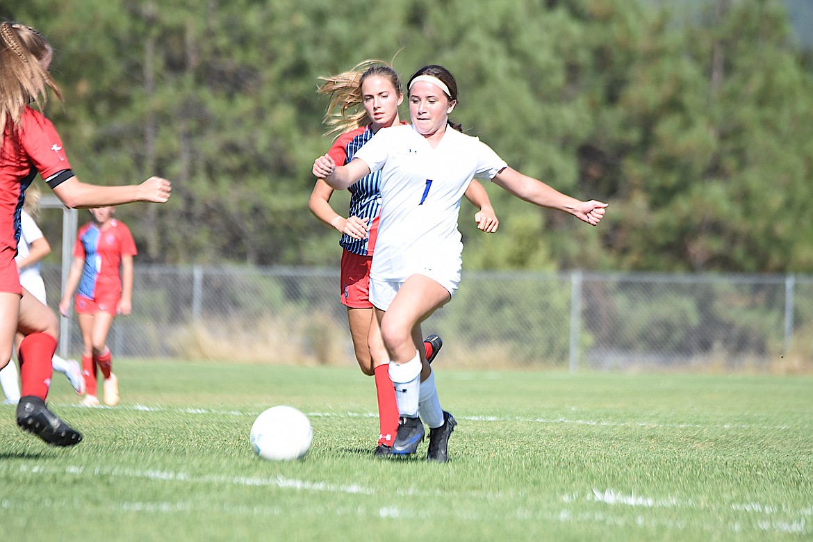 Libby Lady Loggers Madison Vincent charges upfield against Loyola Sacred during their home opener on Sept. 1 at J. Neils Memorial Park. (Scott Shindledecker/The Western News)