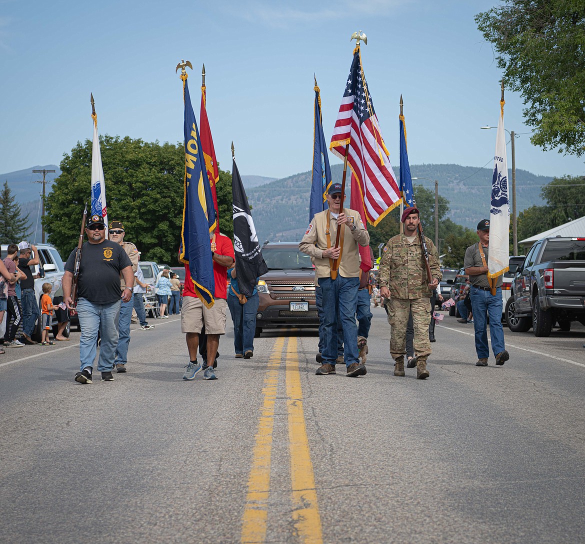 The Plains military honor guard at the Sanders County Fair parade. (Tracy Scott/Valley Press)