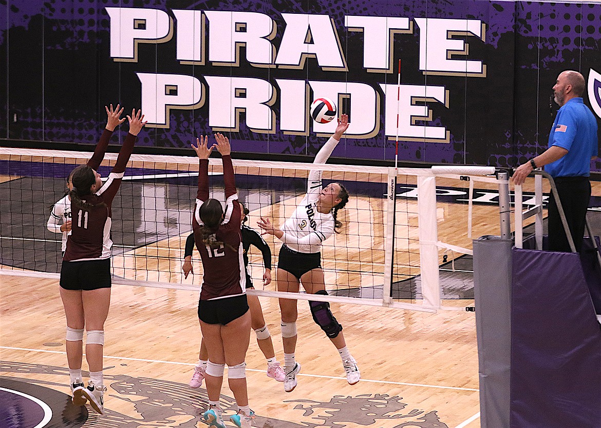 McKenna Hanson delivers the kill for Polson against a tough Hamilton team Saturday. (Bob Gunderson photo)