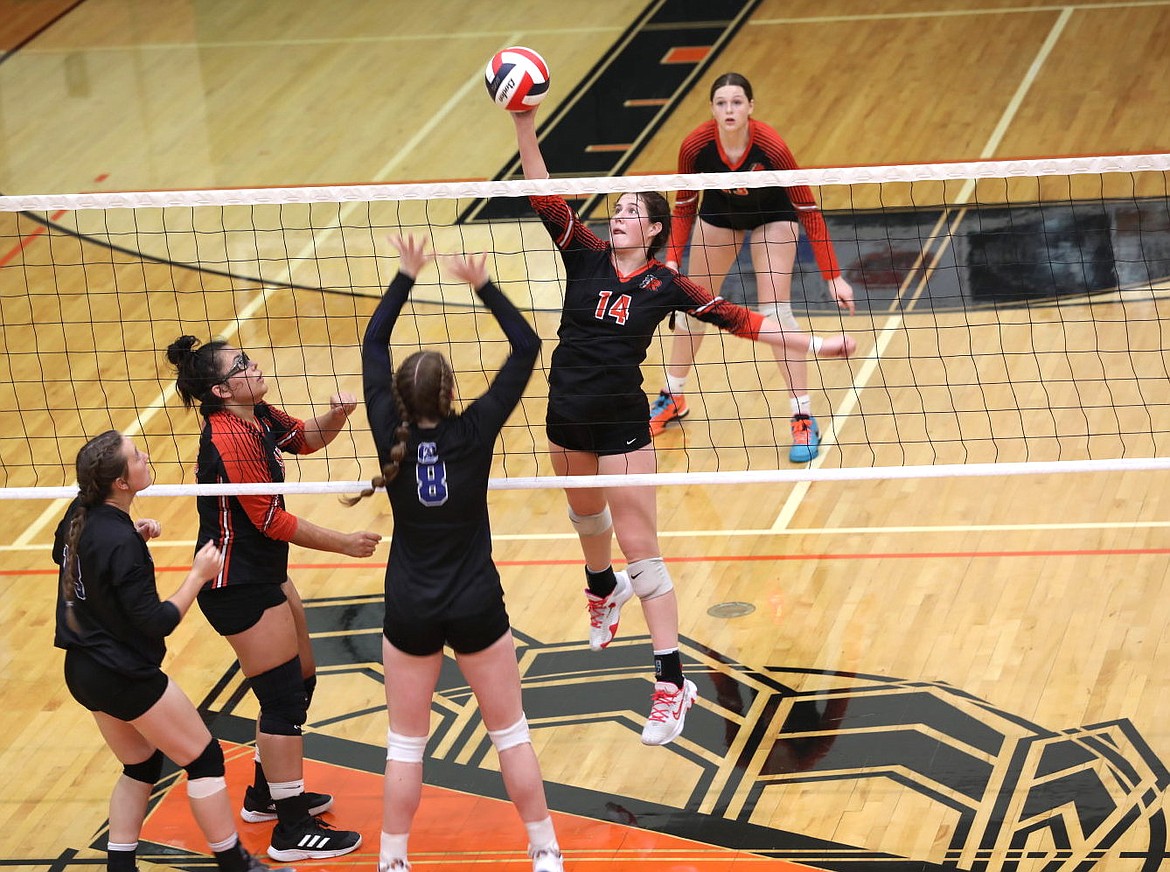 Ronan Maiden Kylee Kelch reaches for the ball in last week's game against Corvallis. (Photo by Susan Lake)