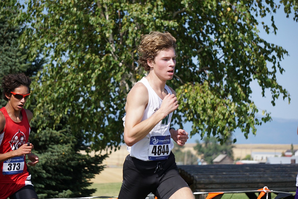 Whitefish competitor Ethan Amick (11) finishes the Flathead Invite with a time of 17:08.06 on Friday. (Photo provided)