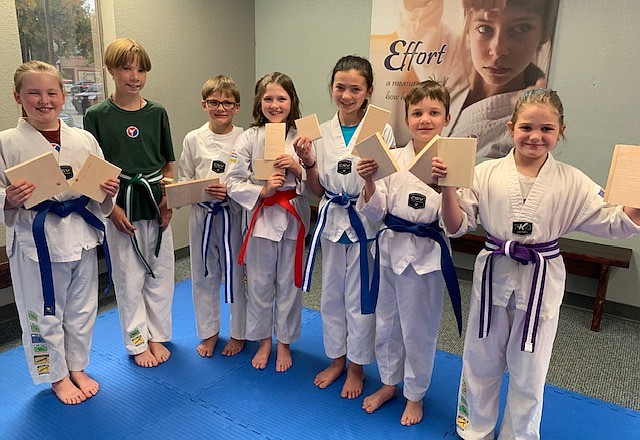 Sandpoint Martial Arts athletes after completing their belt testing. Pictured, left to right, Addisyn Holland (Blue Belt), Blaise Baillie (Green Stripe Belt), Croix Kruse (Blue Stripe Belt), McKenzie Holland (Red Belt), Emerson Kruse (Blue Stripe Belt), Finnegan Peterson (Blue Belt), Mandolin Hinshaw (Purple Stripe Belt).