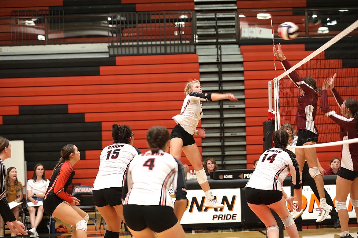 Ronan's Lauryn Buhr sends the ball back to Hamilton during last week's double-header. (Photo by Susan Lake)