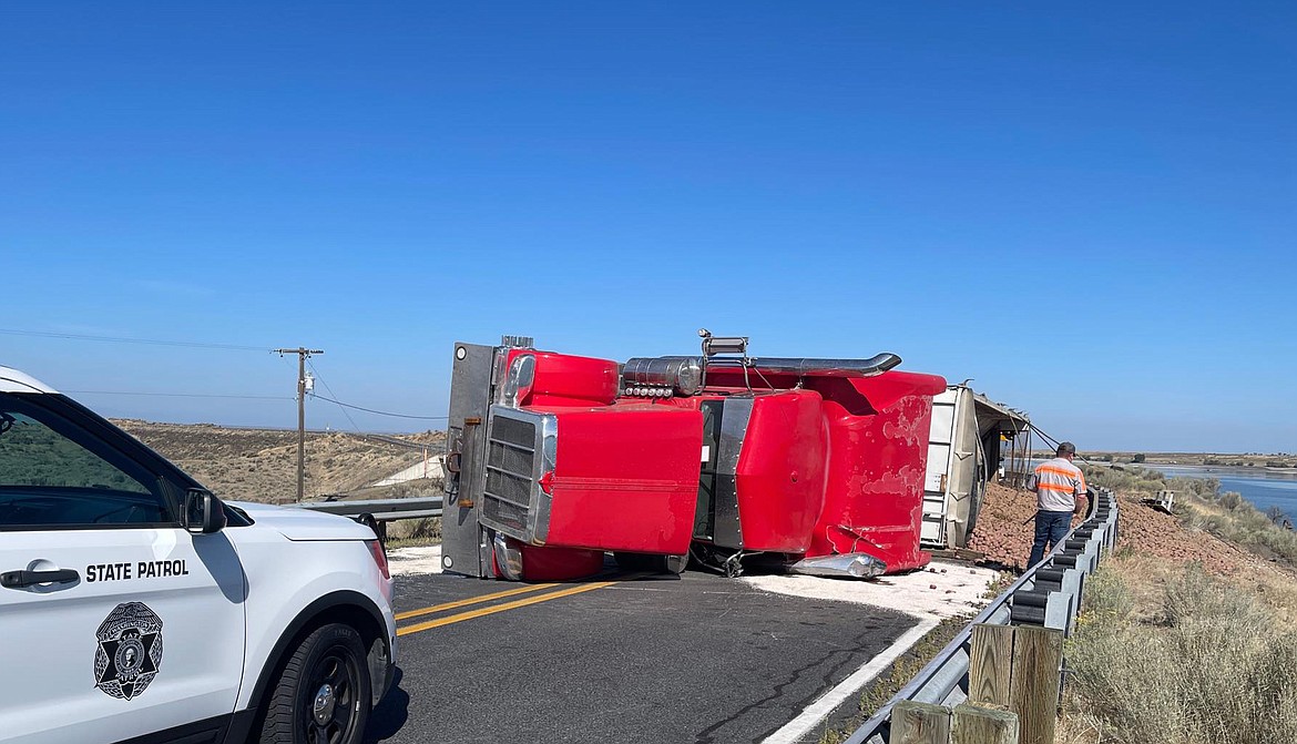 An overturned semi hauling potatoes blocked SR 26 east of MarDon Tuesday morning. The highway remained closed at press time.