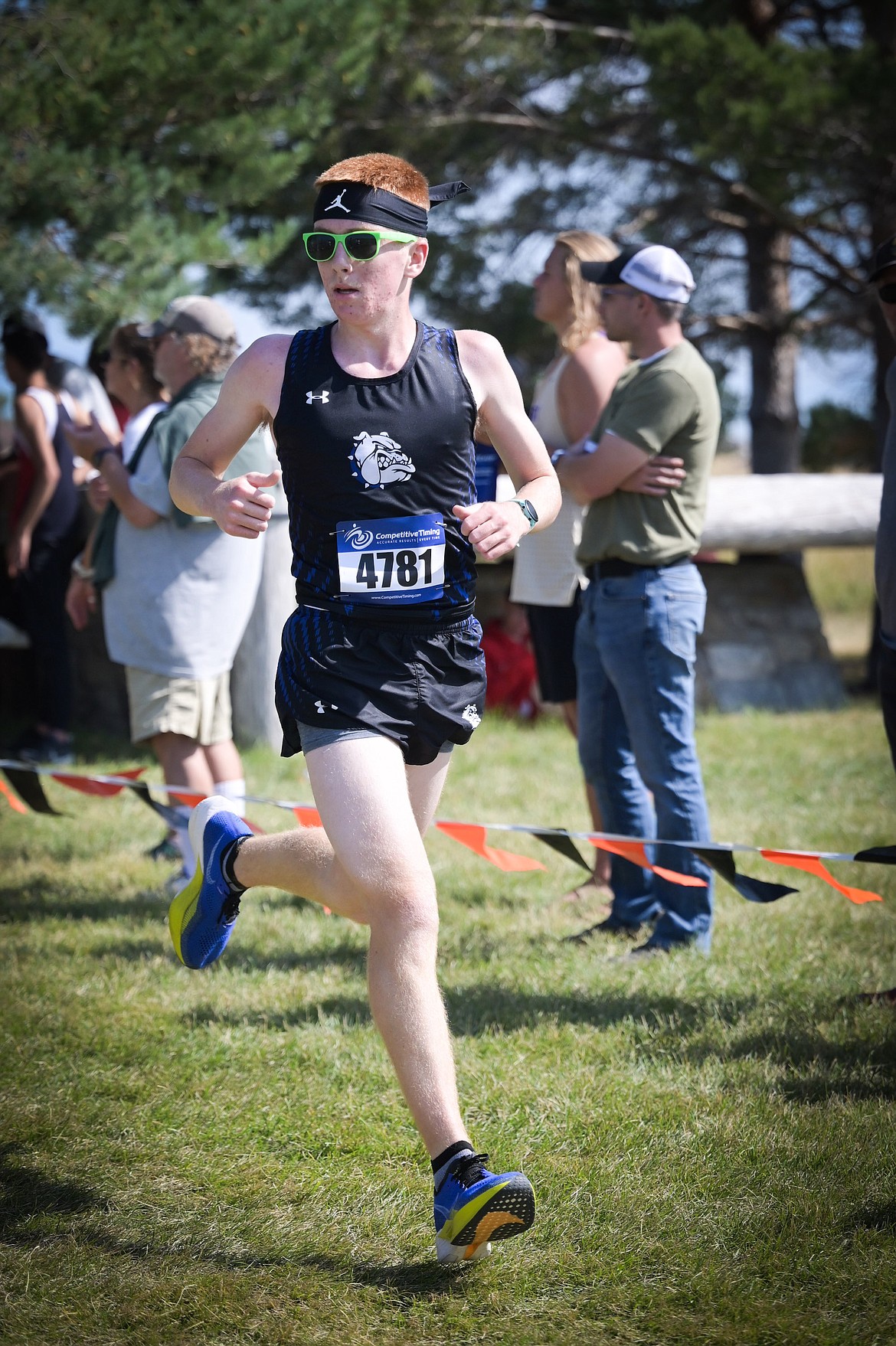 Mission's Harlon Leishman stretches out during the Flathead Invitational in Kalispell. (Photo by Christa Umphrey)