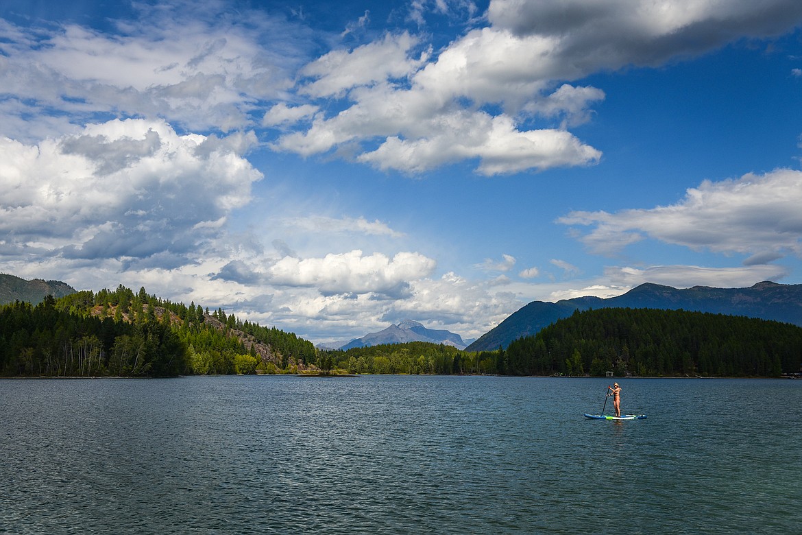 Justyna Hajduk, from Warsaw, Poland, paddles around Lake Five on Wednesday, Sept. 6. (Casey Kreider/Daily Inter Lake)