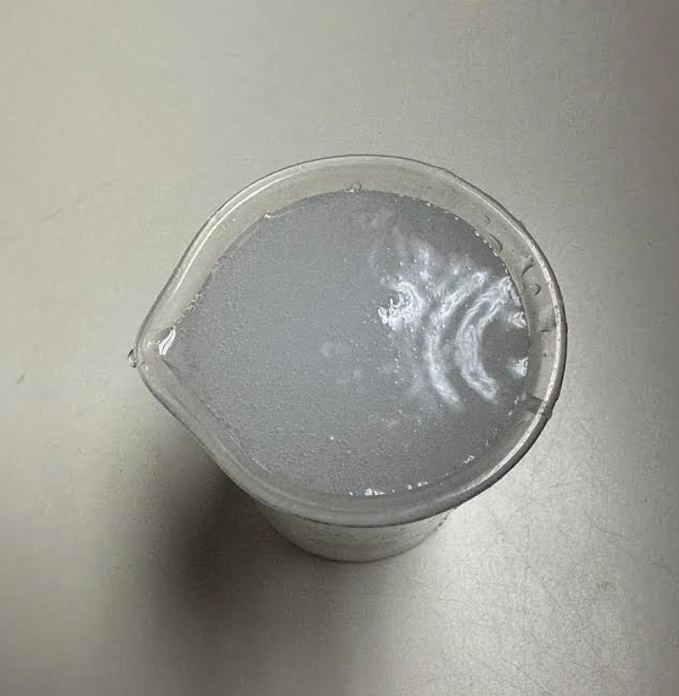 This sample of water from Harrison City Hall taken Aug. 29 shows a milky coloration caused by air in the lines.