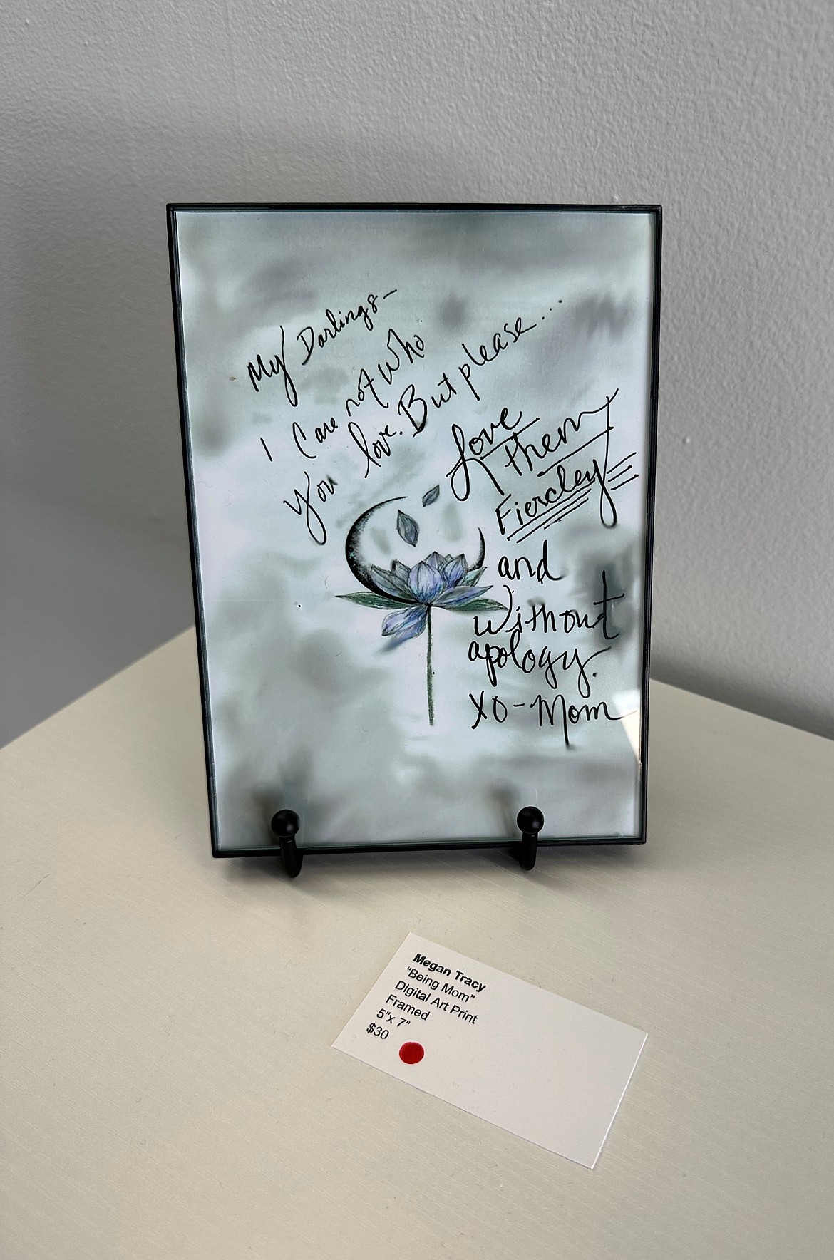 A piece of artwork by Megan Tracy titled "Being Mom" captured a love letter from a mother to her daughter about coming out.