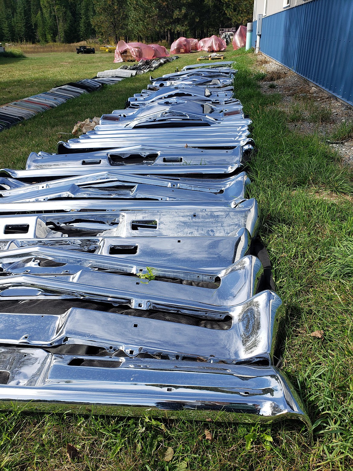 The Langlitz siblings sort through thousands of Chevrolet parts to lay them out across 24,000 square feet of lawn for an auction scheduled Sept. 16.