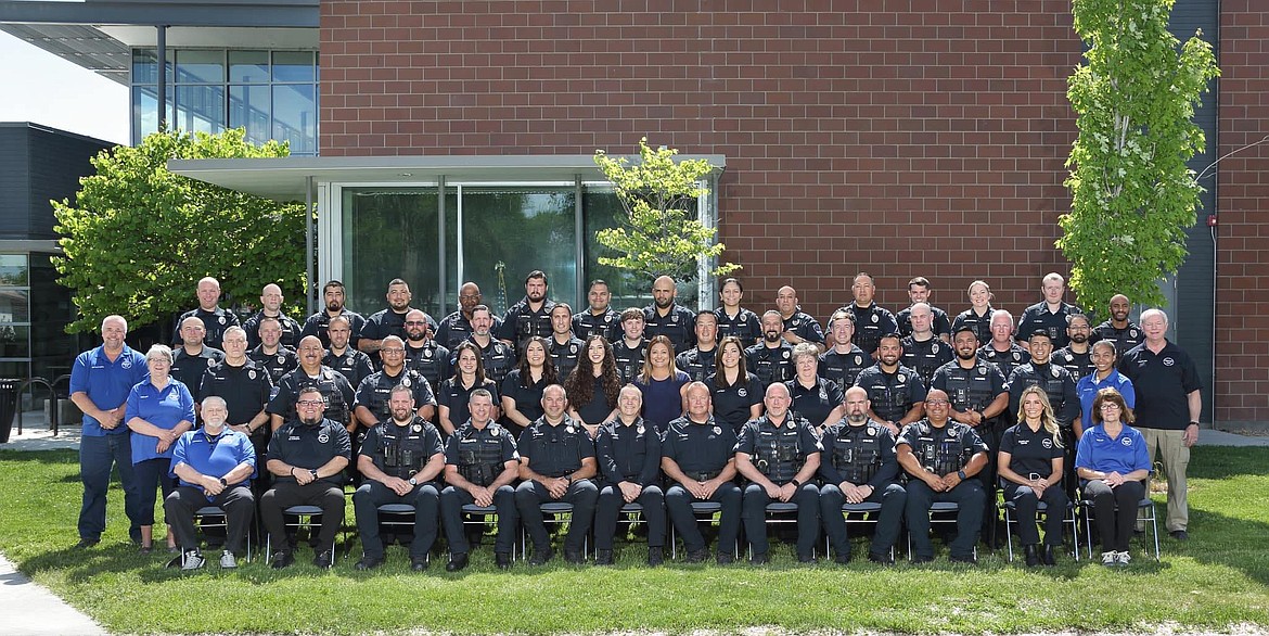 The Moses Lake Police Department poses for a group photo in front of the Moses Lake Civic Center.