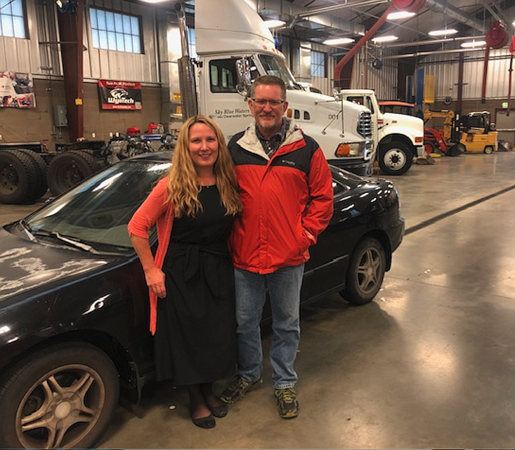 Tiffany and Paul Kugler are seen Aug. 30 at the Kootenai Technical Education Campus with the 1995 Acura Integra they donated to Charity Reimagined's Rides for a Reason program. Through the program, KTEC auto students will gain work experience and the car will be purchased by someone in the community in need of a lower cost vehicle.