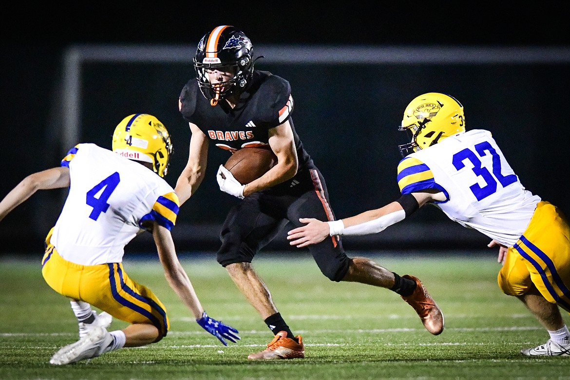 Flathead wide receiver Brody Thornsberry (88) picks up yardage on a run in the third quarter against Missoula Big Sky at Legends Stadium on Friday, Sept. 8. (Casey Kreider/Daily Inter Lake)