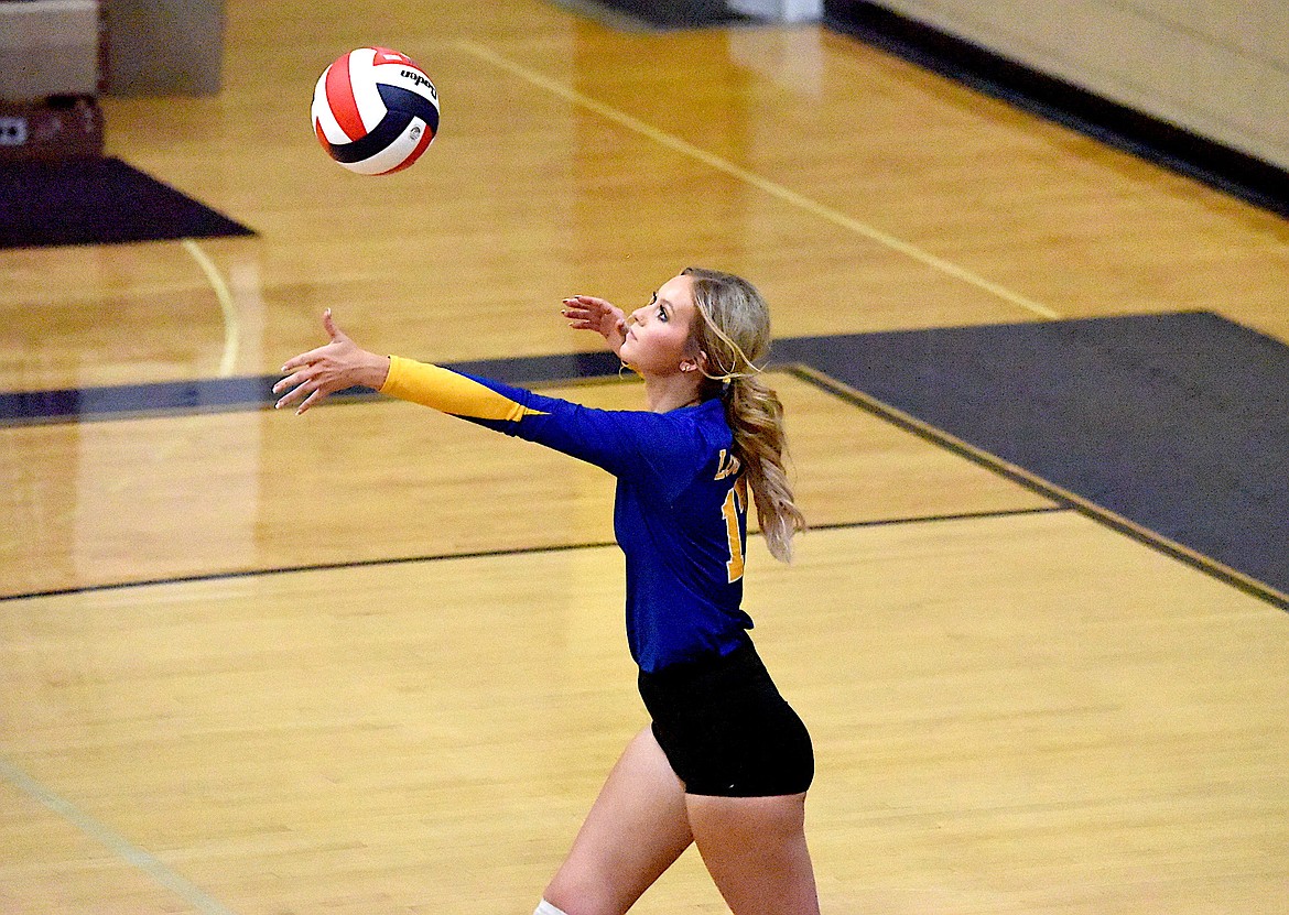 Libby's Lyndee McElmurry winds up for a serve against Columbia Falls on Thursday, Sept. 7. (Scott Shindledecker/The Western News)
