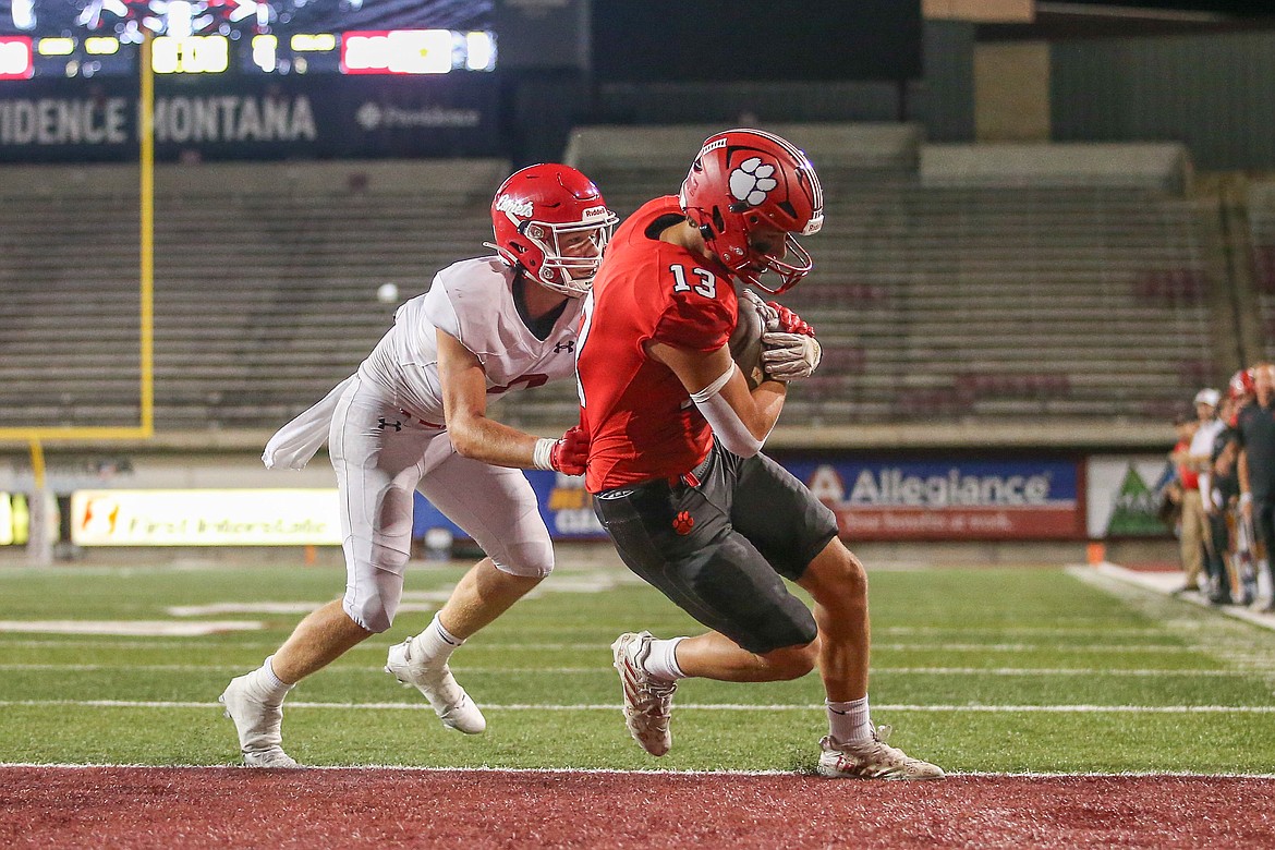 Sandpoint junior Jesse Turner hauls in a 4-yard touchdown pass from Drew Lehman to put the Bulldogs ahead 27-20 early in the fourth quarter.