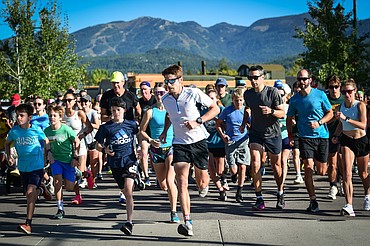 Participants take off at the start of the one mile run at the Whitefish Community Foundation's Great Fish Fun Run in Whitefish on Saturday, Sept. 9. (Casey Kreider/Daily Inter Lake)