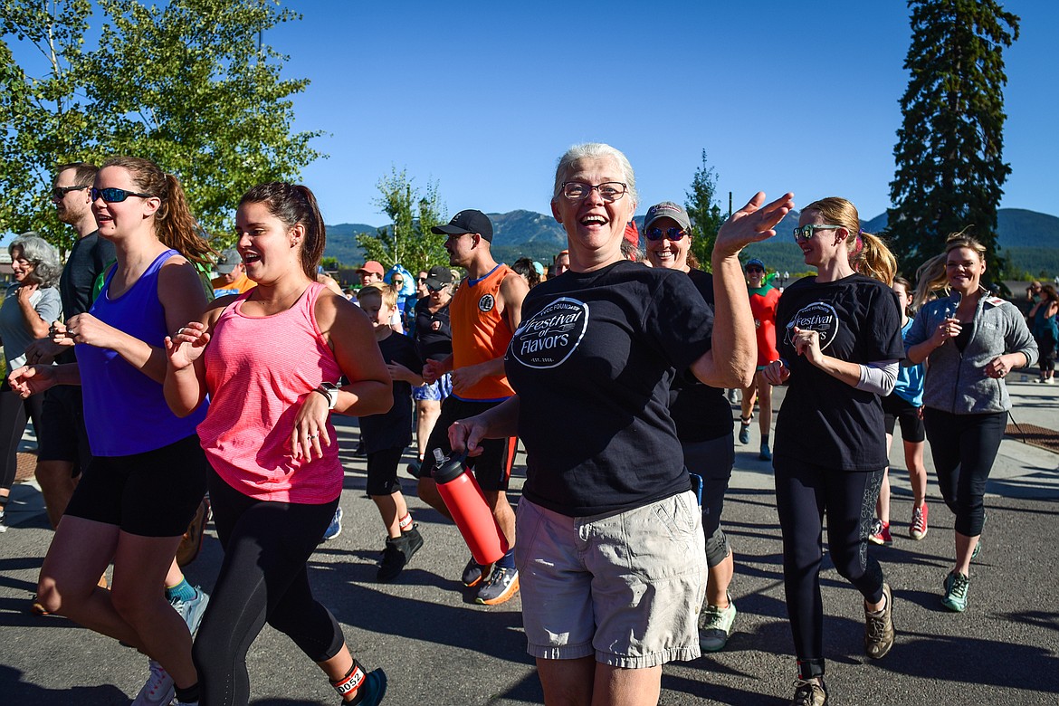 Participants take off at the start of the 5K run at the Whitefish Community Foundation's Great Fish Fun Run in Whitefish on Saturday, Sept. 9. (Casey Kreider/Daily Inter Lake)
