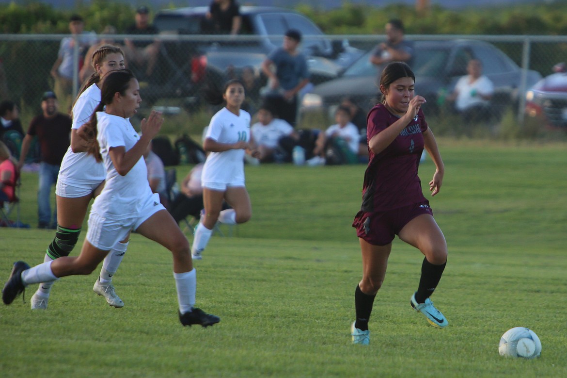 Wahluke freshman Ashya Erazo (4) scored the Warriors’ first goal of the game against Quincy on Thursday.