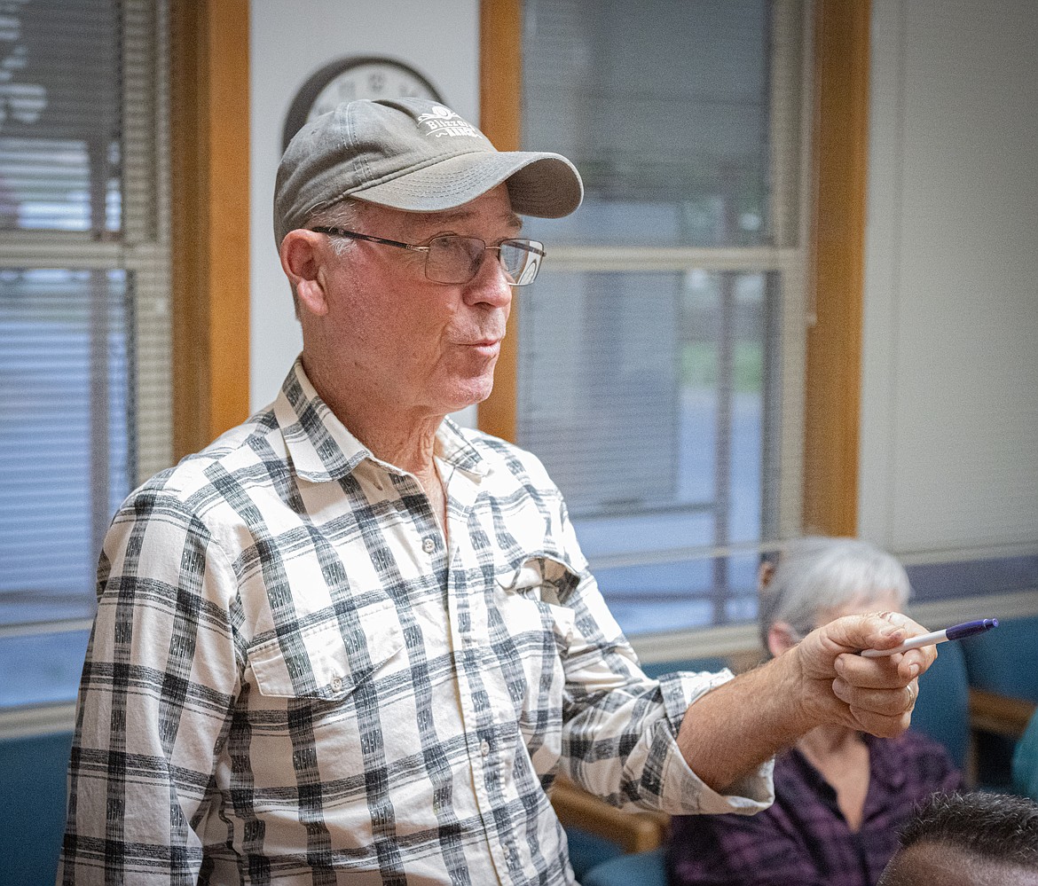 Dick Blizzard discusses efforts to restore the horse sculptures along Montana 200 at the Plains Town Council meeting. (Tracy Scott/Valley Press)