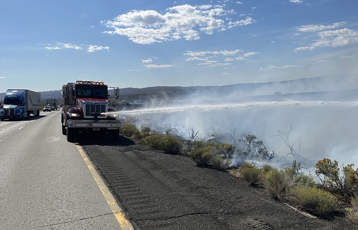 Crews battle the Tendollar fire along I-82 between Yakima and Ellensburg Sunday. A variety of vehicles are used throughout Washington to deal with different types of fires from burning shrub-steppe to mountainous forests.