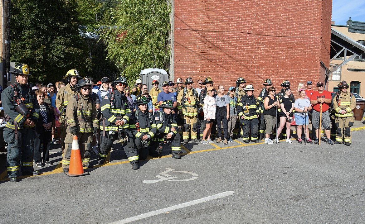 Participants gathered for a photo taken by drone at the Wallace 9/11 stair climb.