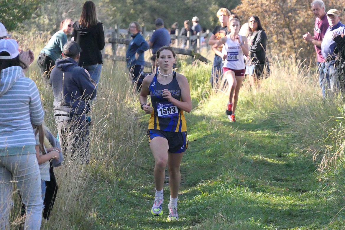 Thompson Falls cross country runner Faith Palmer approaches the finish line at the Canal Run near Ronan this past Saturday.  Palmer finished four individually and helped the Lady Hawks claim fourth in the team title competition.  (Chuck Bandel/VP-MI)