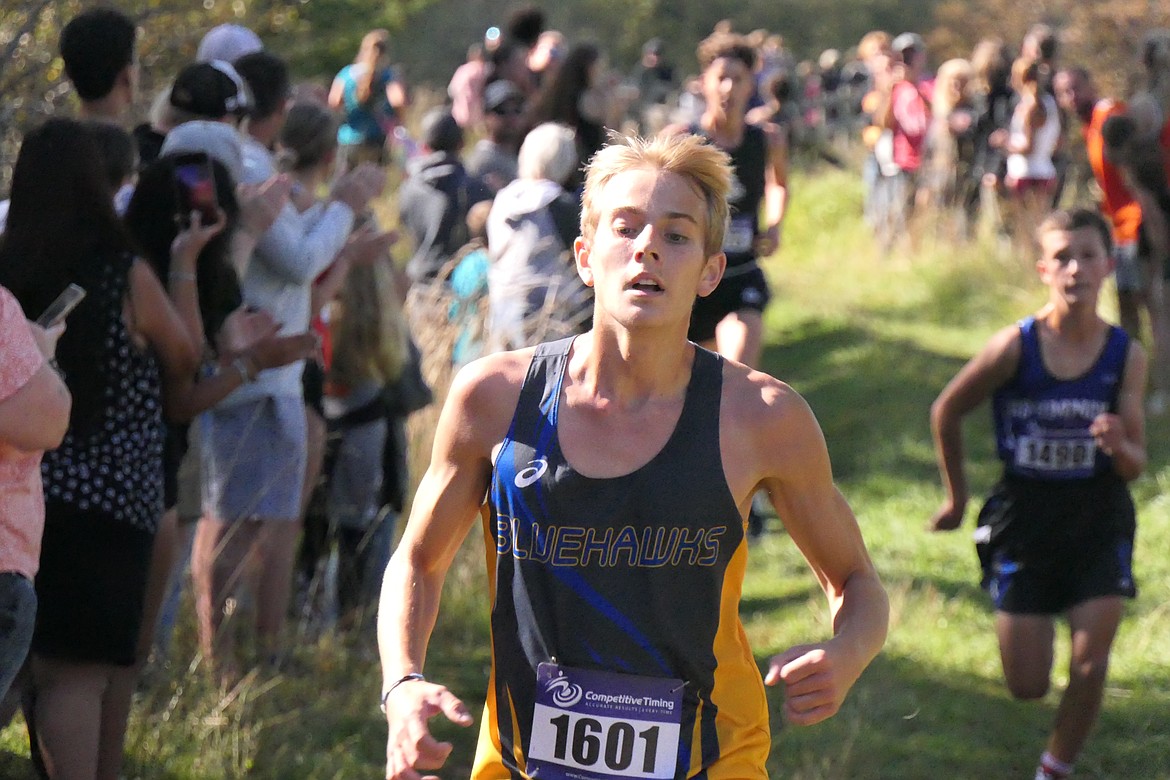 Blue Hawks senior Cael Thilmony crosses the finish line in eighth place during this past Saturday's first ever Canal Run cross country meet.  (Chuck Bandel/VP-MI)