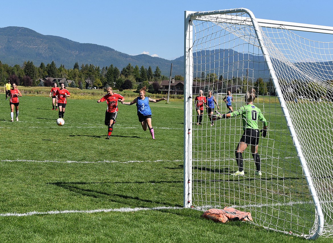 A race to the ball during the Summer Games. (Julie Engler/Whitefish Pilot)