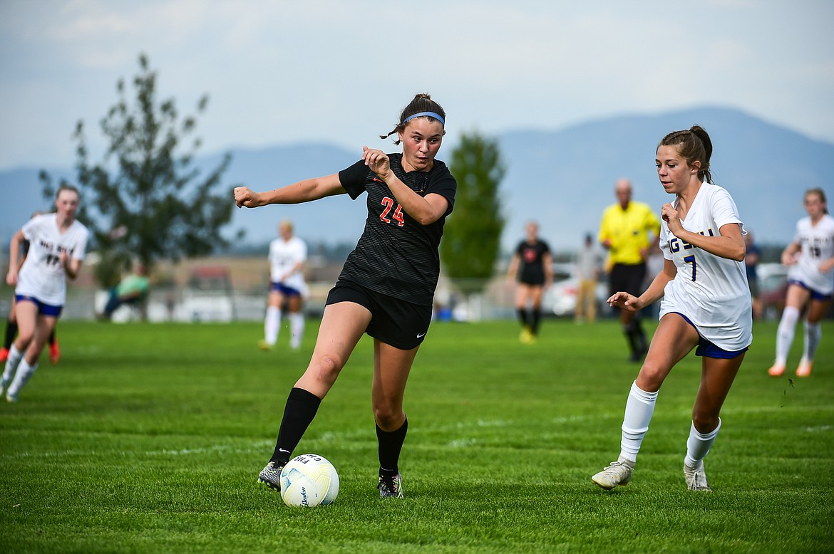 Flathead's Azalea Bailey (24) works the ball into the Big Sky zone in the first half at Kidsports on Tuesday, Sept. 12. (Casey Kreider/Daily Inter Lake)