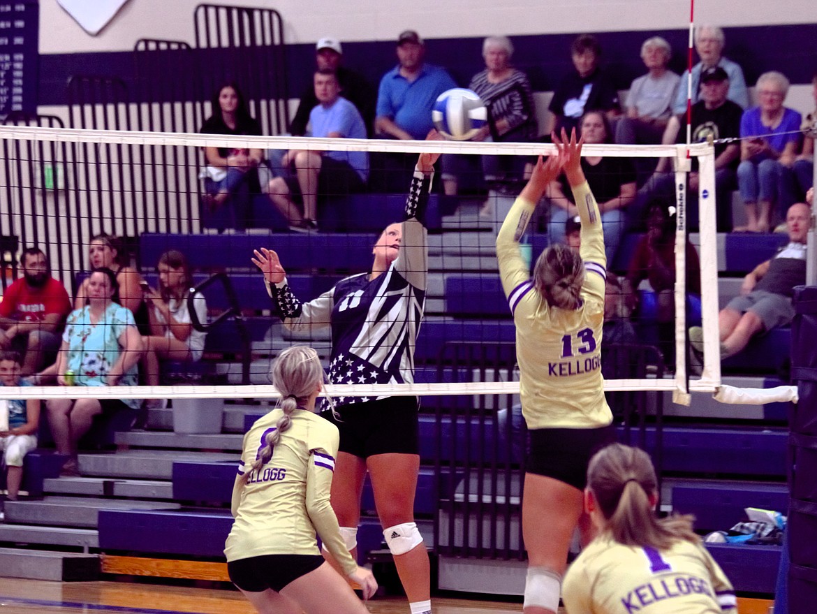 Helene Rae continues a volley for the Badgers against Kellogg earlier in the season.