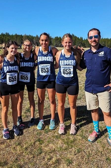 Badger girls cross country and coach at the Farragut race last Saturday.