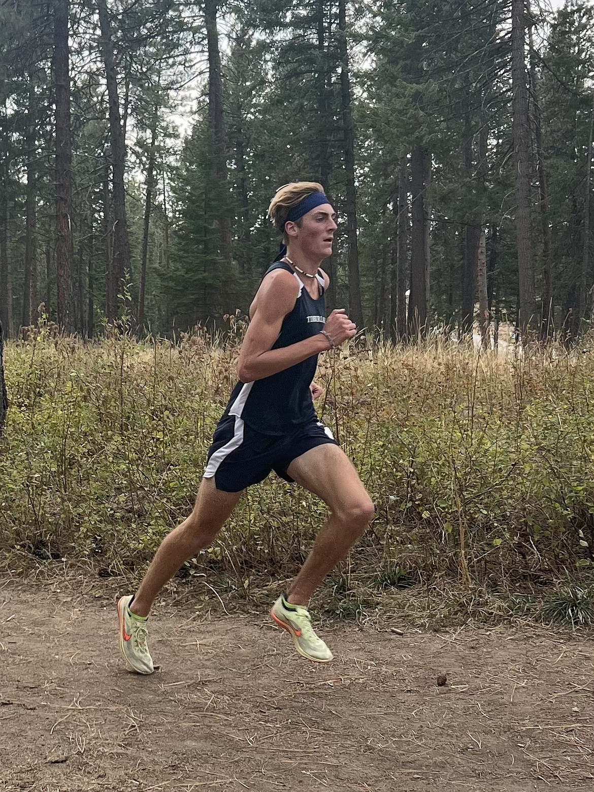 Photo by JOSH HEGSTAD
Jacob Barnhart of Timberlake races to the boys title at the English Point Dual with Lake City on Tuesday at English Point Recreation Trails in Hayden.