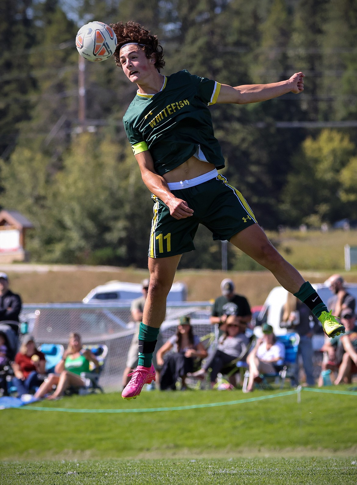 Whitefish forward Collin Lyman heads the ball during the Bulldogs' 4-0 over Bigfork Saturday. (Jeremy Weber/Bigfork Eagle)