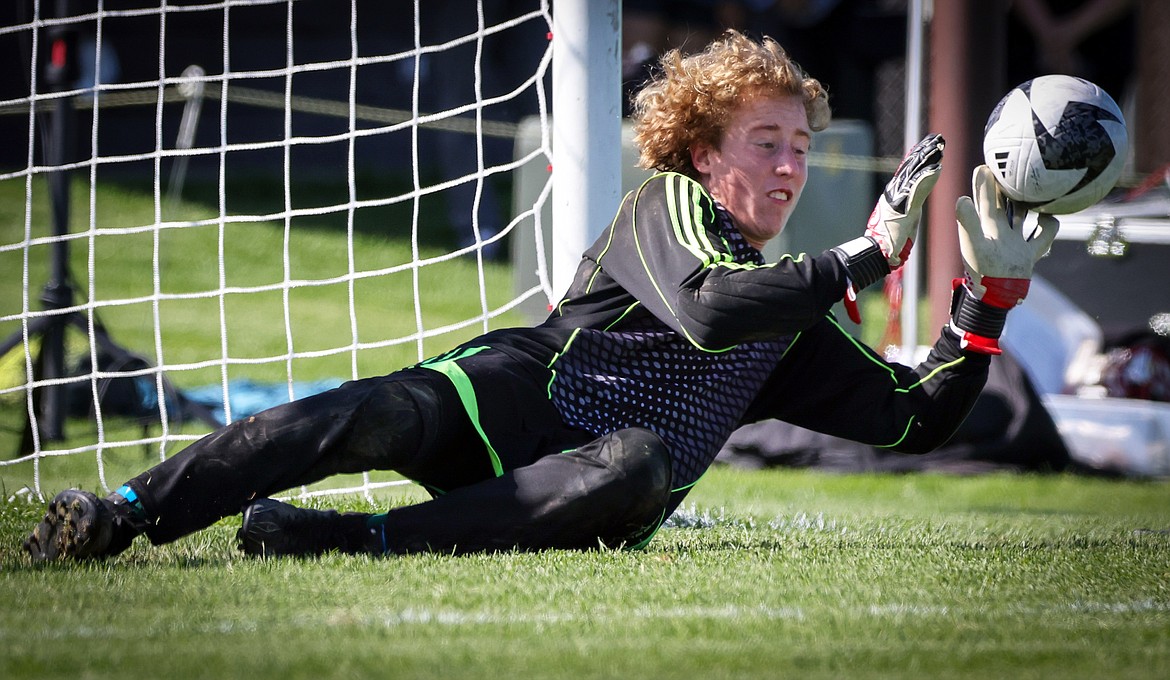 Whitefish keeper Bjorn Bungener makes a save of a Bigfork shot in the Bulldogs' 4-0 win over the Vikings Saturday. (Jeremy Weber/Bigfork Eagle)