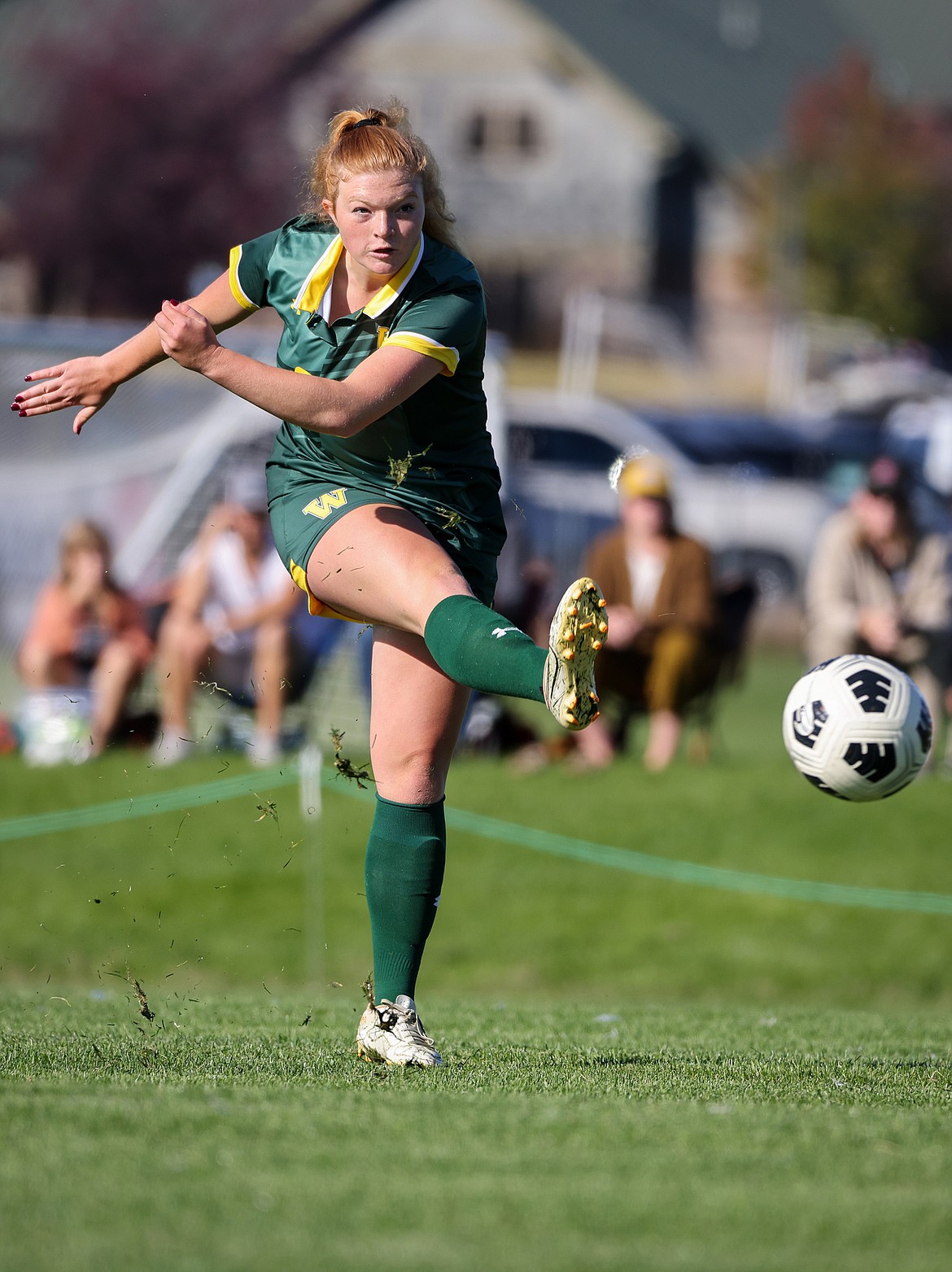 Whitefish's Charlotte Wallace takes a free kick in the Lady Bulldogs' 5-1 win over Bigfork Saturday.