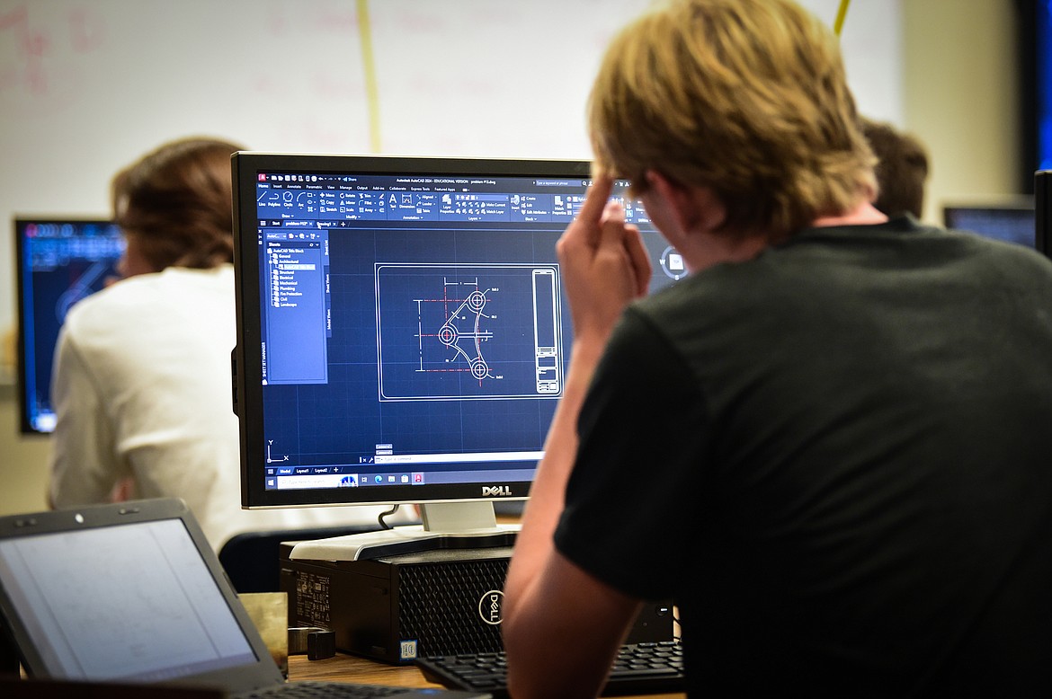 Students use AutoCAD, a 2D and 3D computer-aided design program, during Ryan Boyle's Career Technical Education class at Whitefish High School on Wednesday, Sept. 13. (Casey Kreider/Daily Inter Lake)